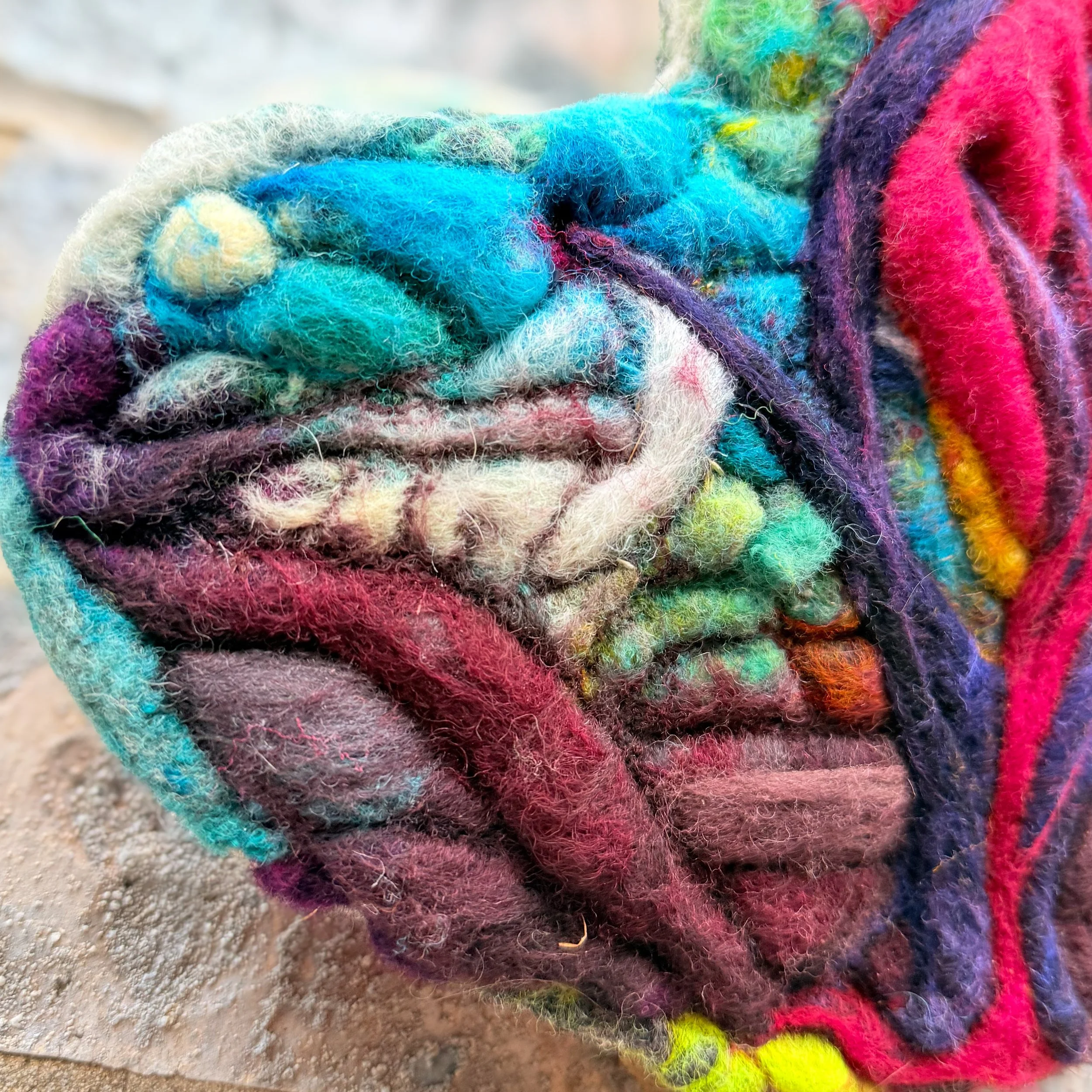 Pierced Compassion is a 7 x 8 inch needle felted wool artwork depicting a sunrise landscape pierced heart and tree of sorrow by fiber artist Kristi Yapp.