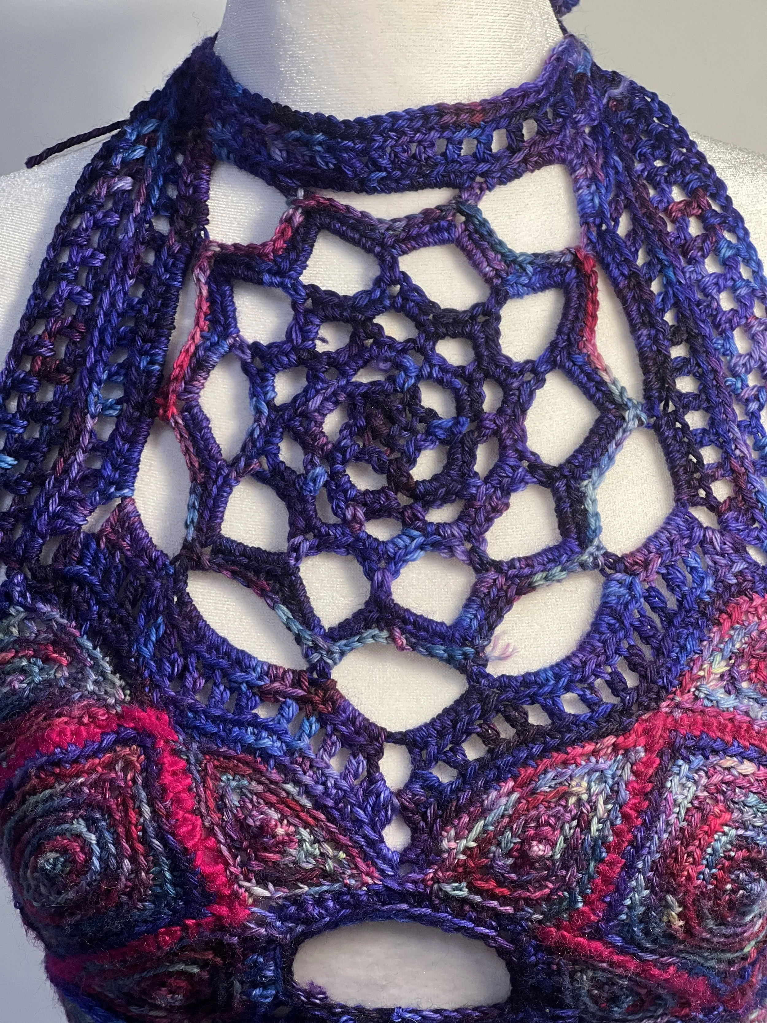 Crochet mandala neckline detail in hand-dyed wool