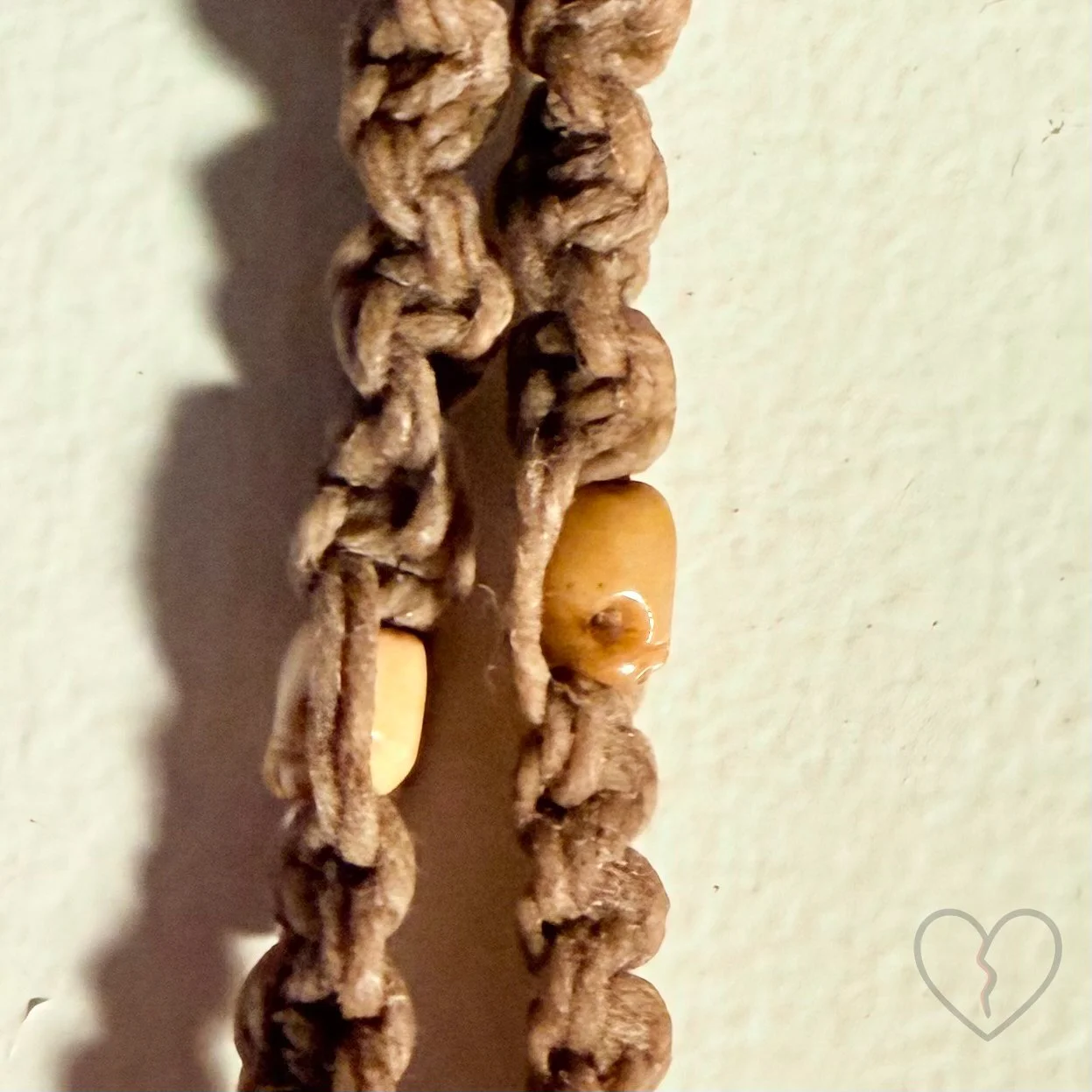 Fiber art necklace with reclaimed pendant, sari silk halo and macrame hemp cord by Kristi Yapp