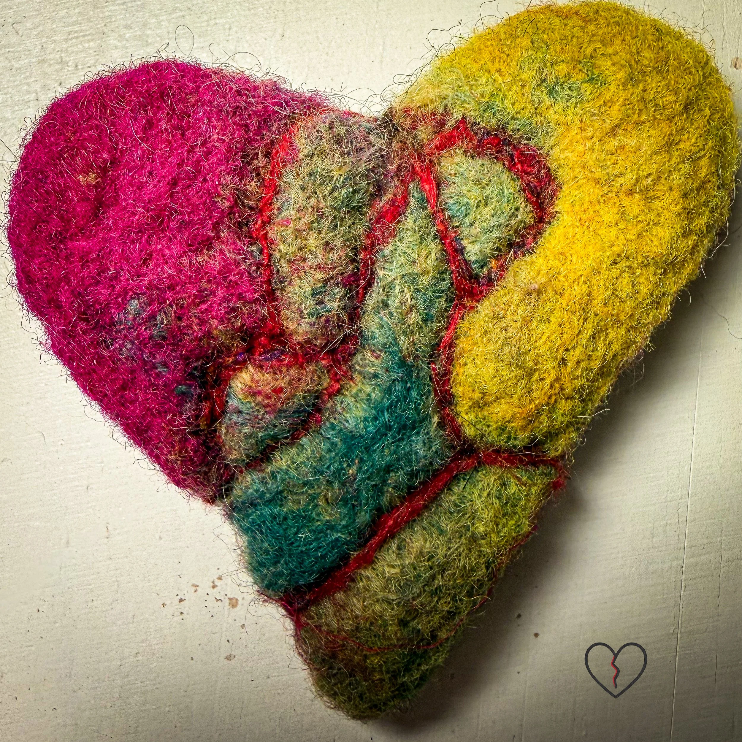 Handmade needle felted wool art pin by fiber artist Kristi Yapp. One of a kind, lightweight, and sculptural wearable fiber art.