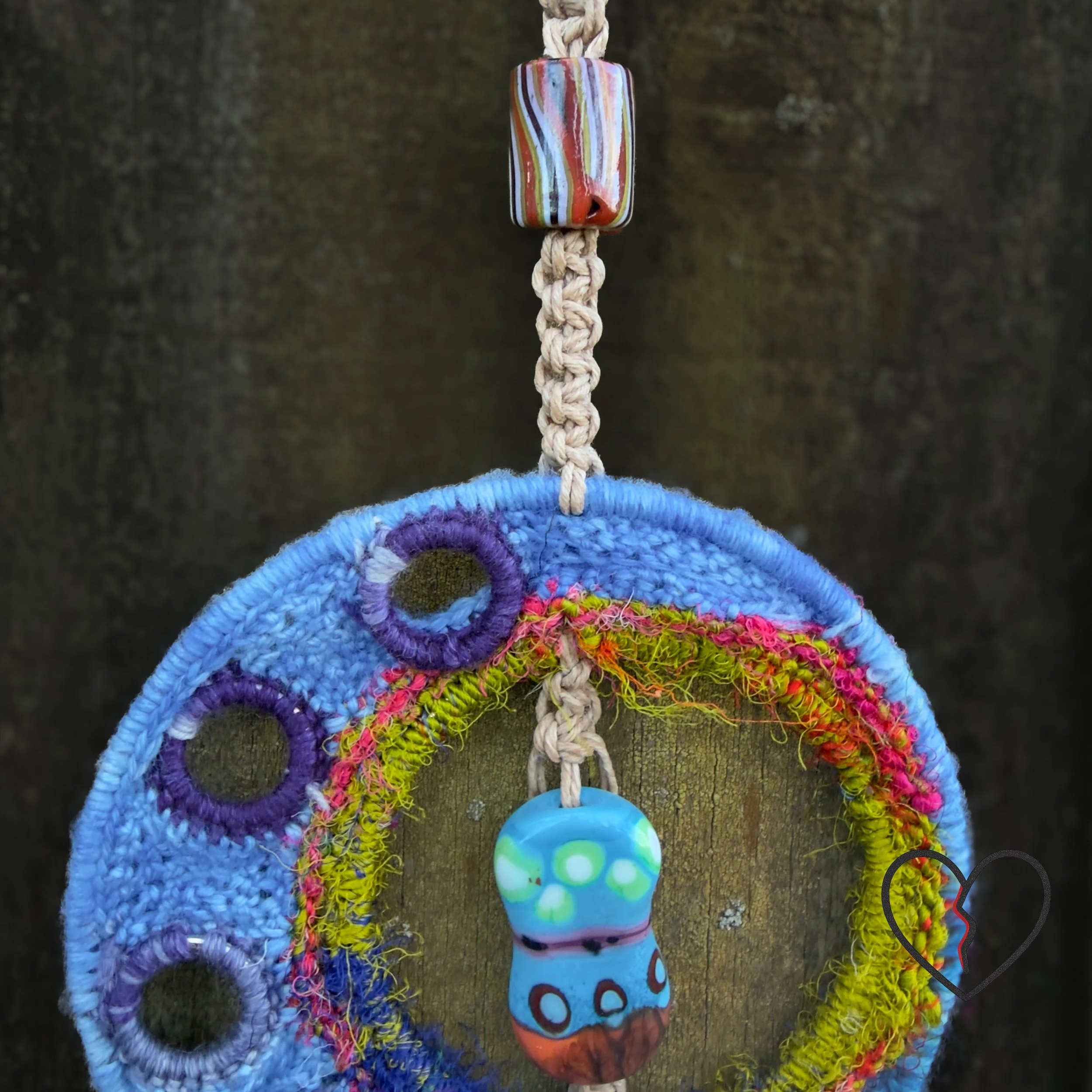Blue crescent moon dreamcatcher with watchful eye bead and trade beads.