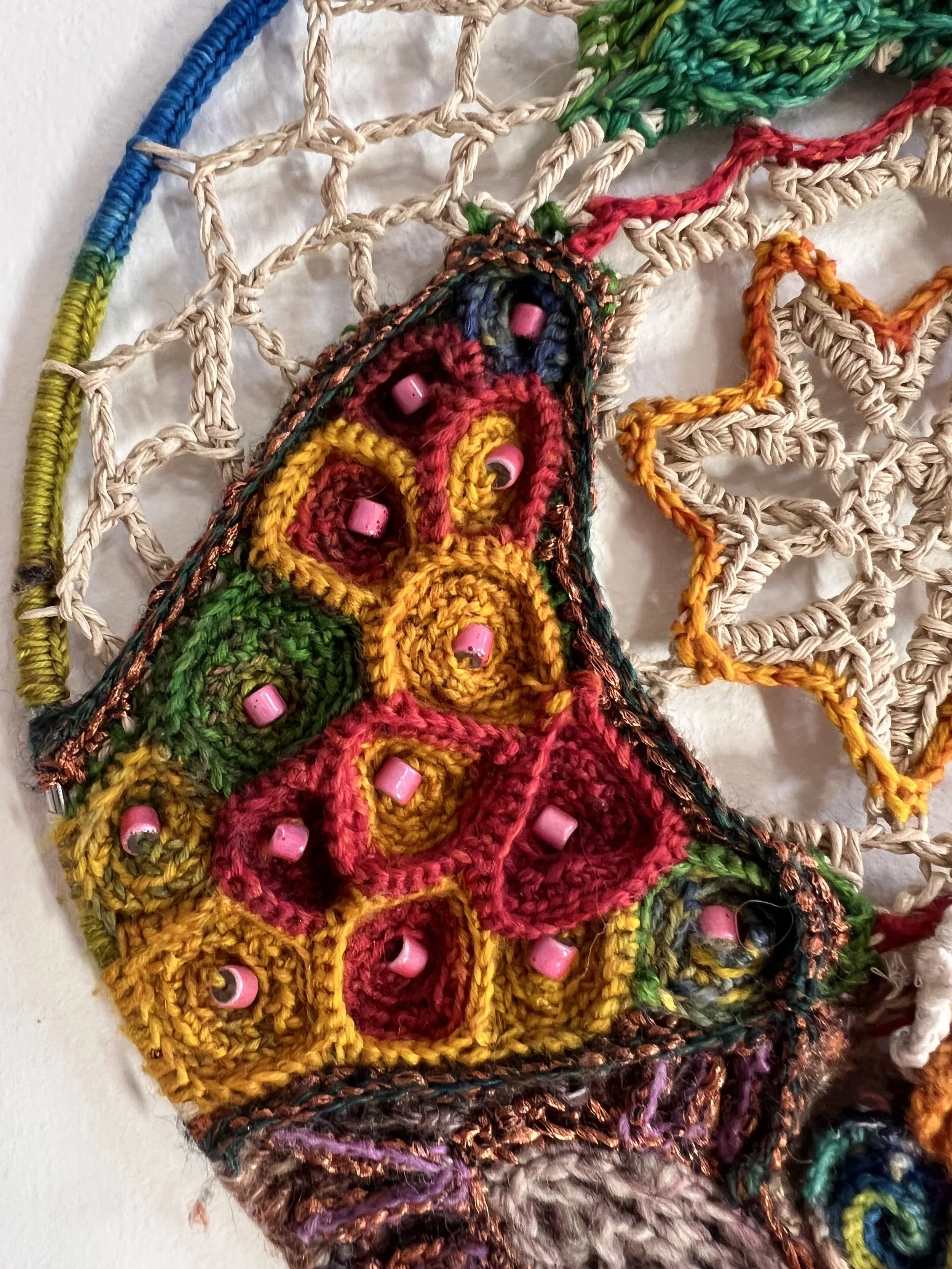 Sol Cycle Spring sun symbolism detail