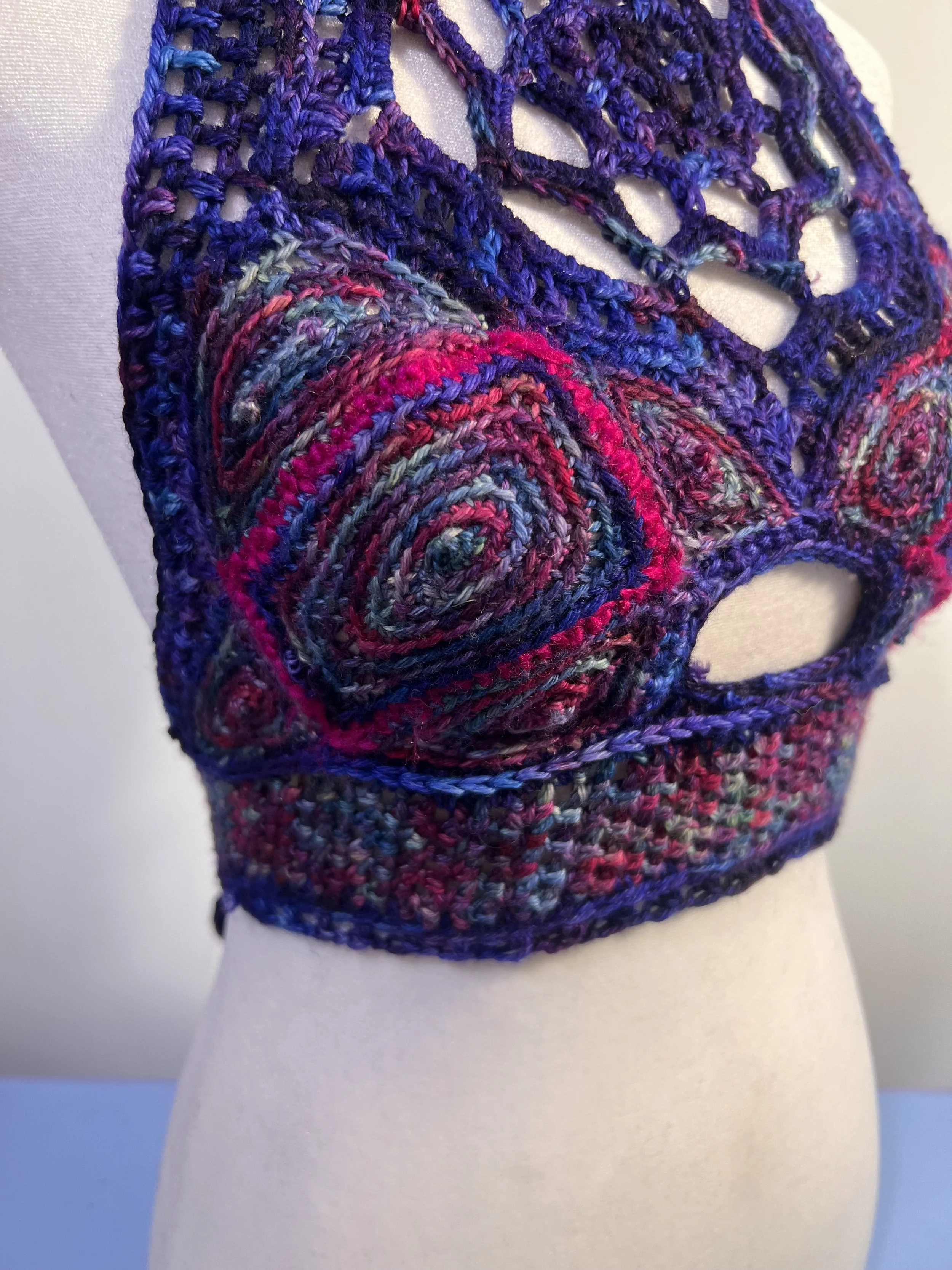 Sculptural crochet bust detail with open navel design