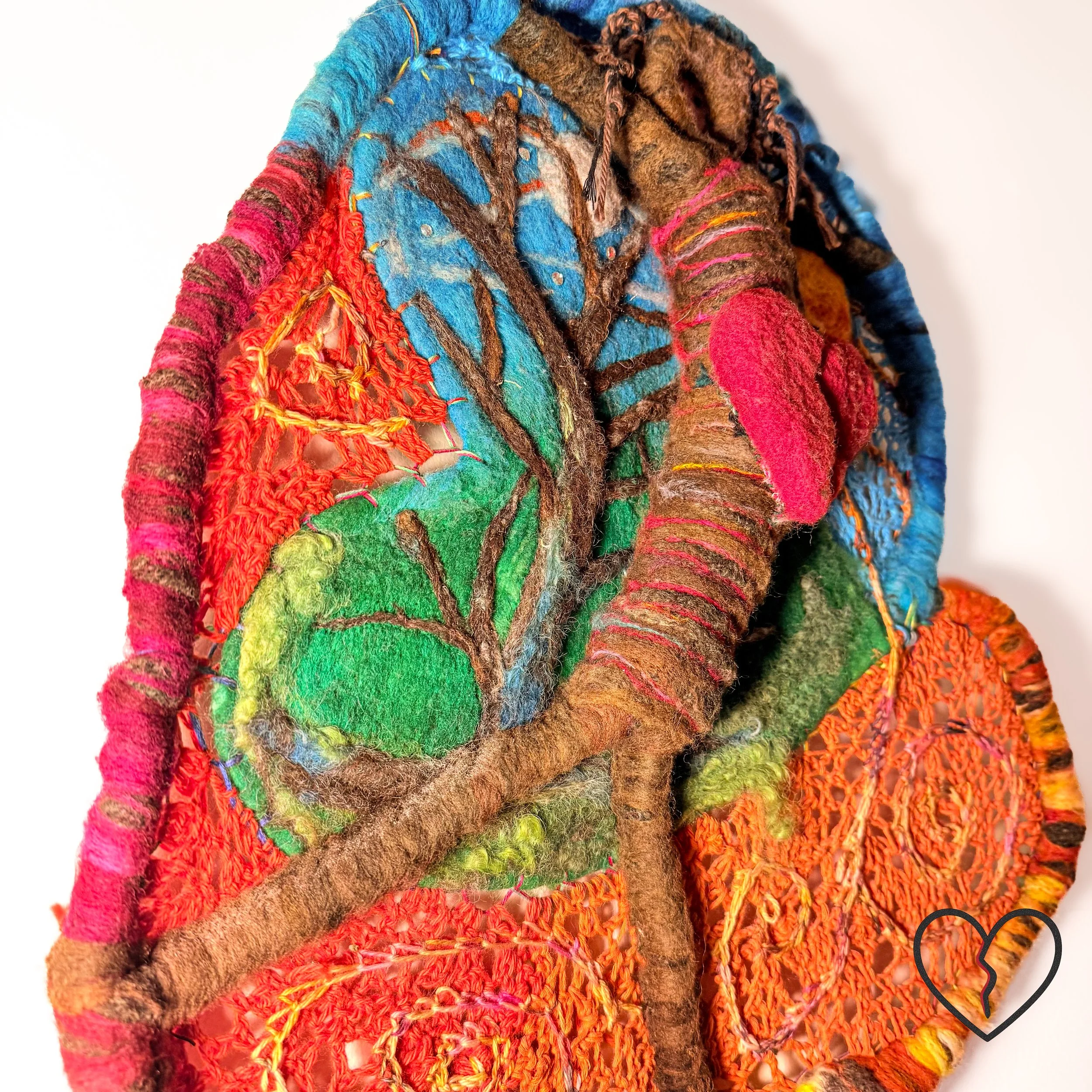 Temporal Arrest is a one of a kind 2024 mixed technique wool art sculpture by Kristi Yapp exploring emotional immobilization, grief, and the passage of time through symbolic fiber construction.