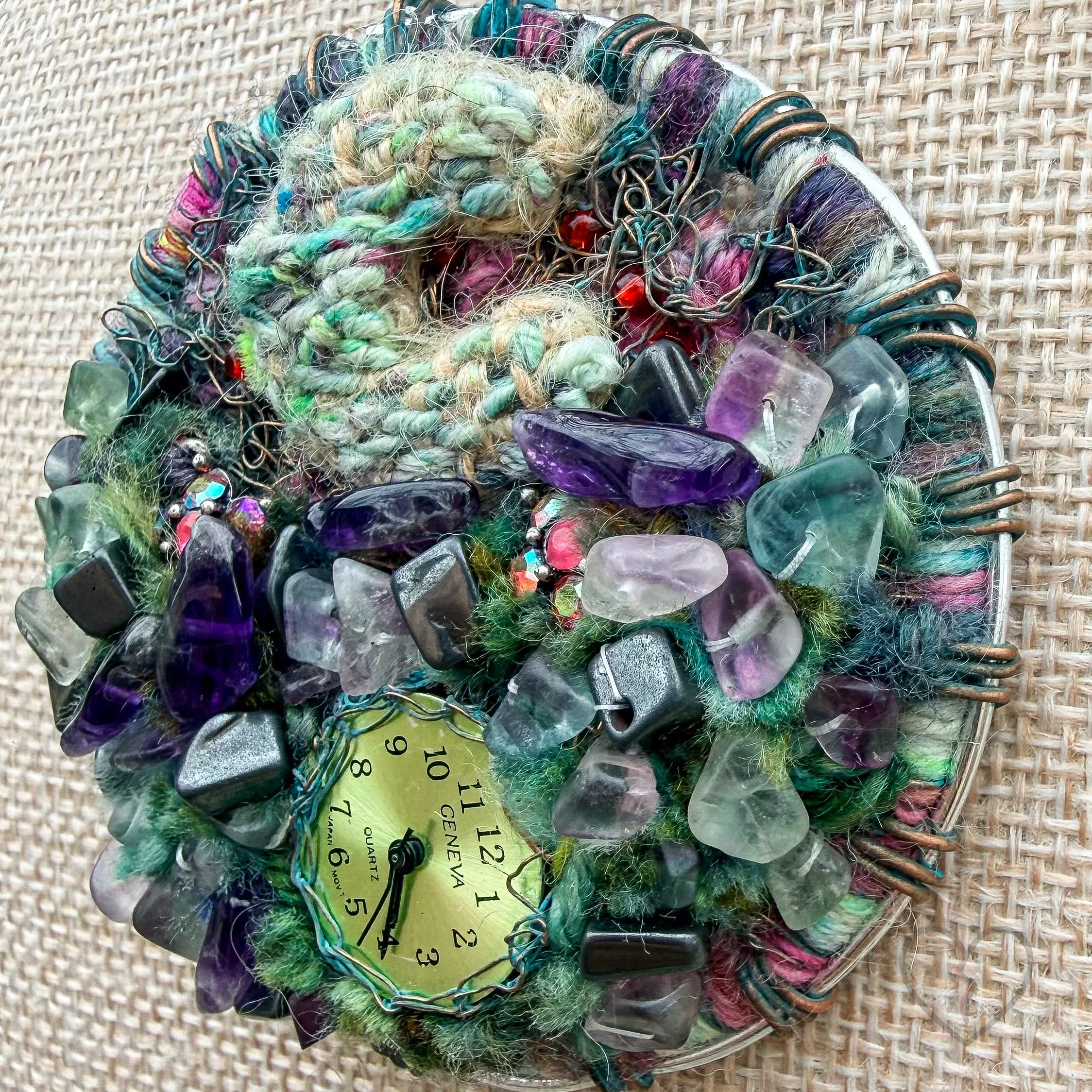 Mixed media fiber necklace with crystals and broken clock face on leather cord