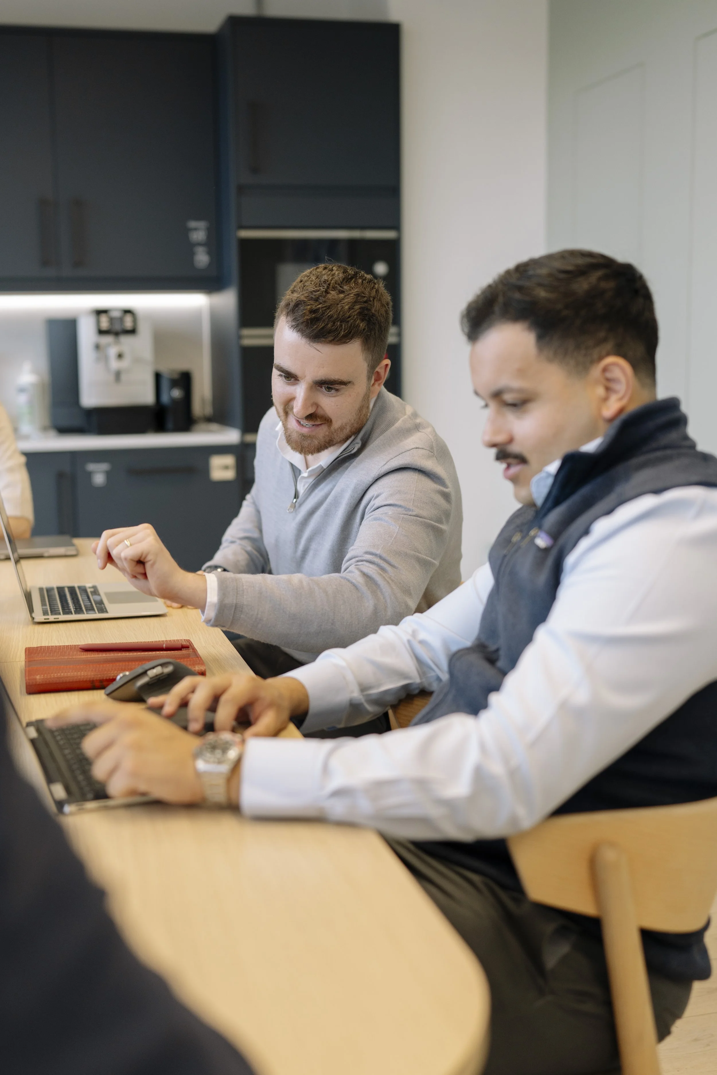 Freddie and Jack in a meeting
