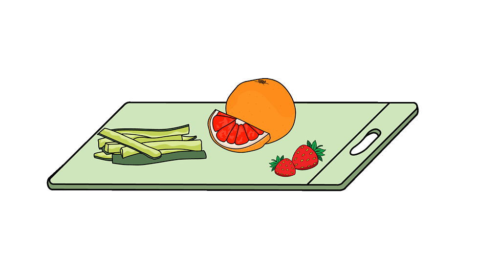 A cutting board with sliced cucumber, a grapefruit, and strawberries.
