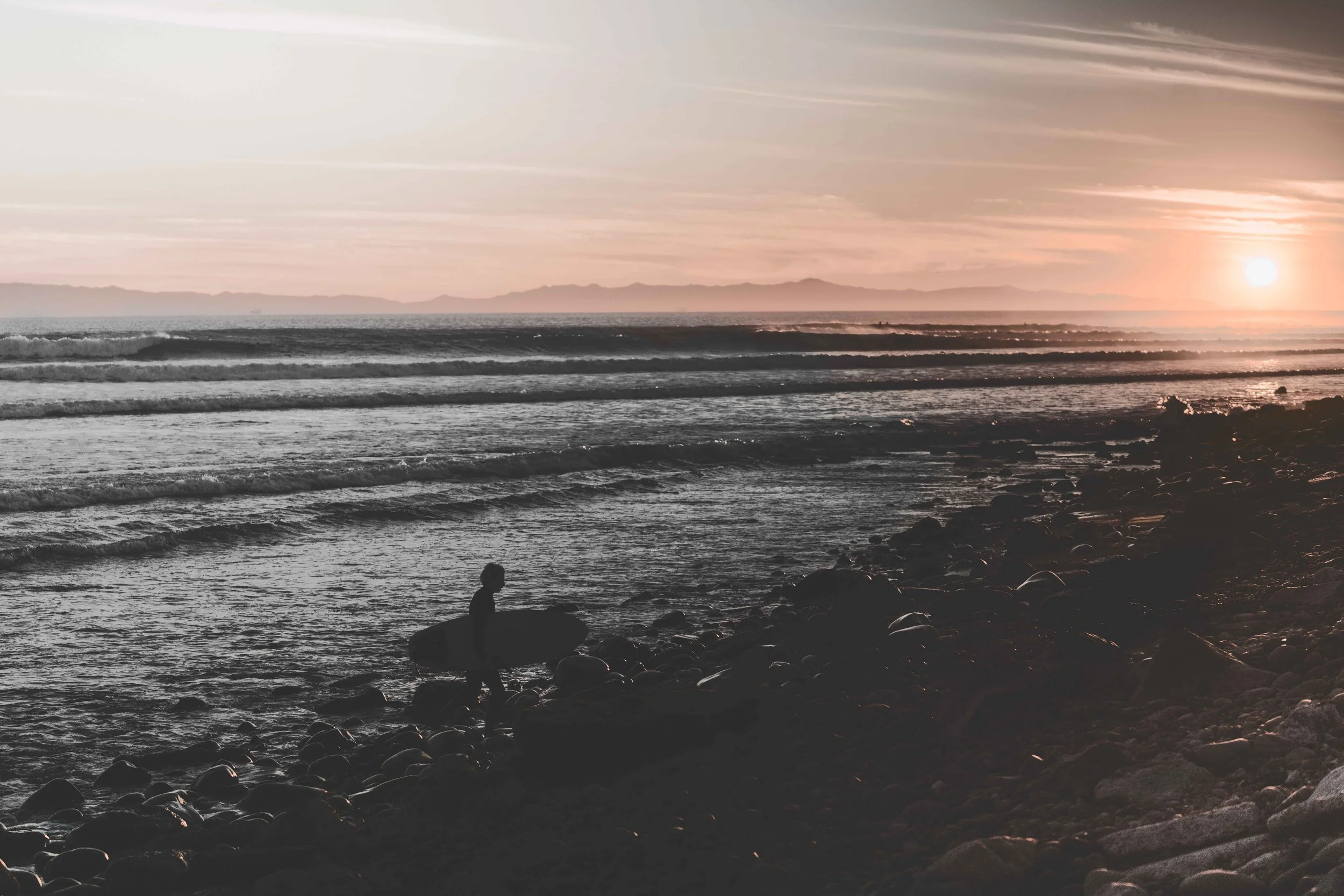 lowtide-surfer-sunset-california-coast.JPG