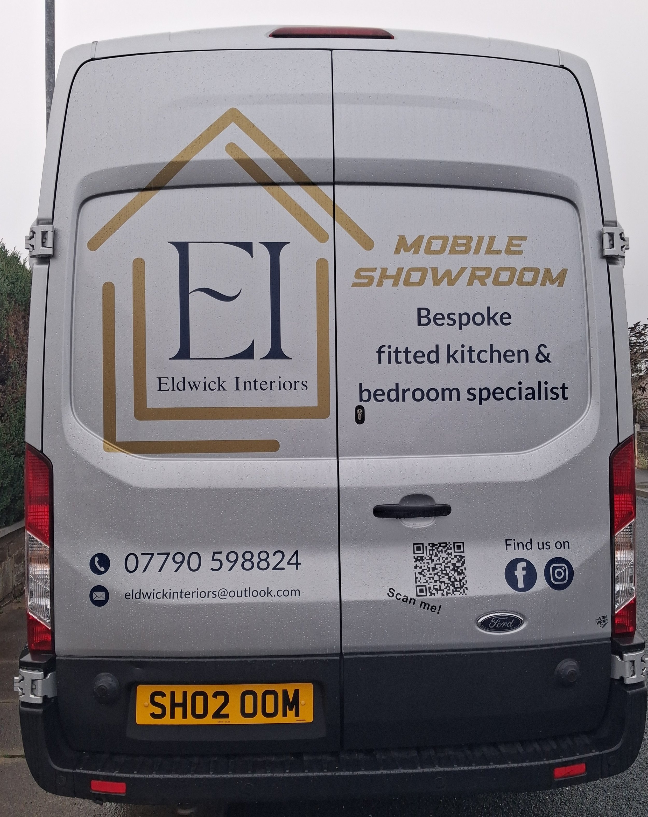 Rear view of the Eldwick Interiors mobile showroom van with branding and contact details