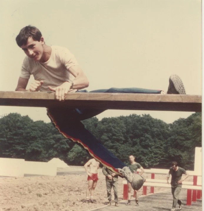 Young man on a military obstackle course