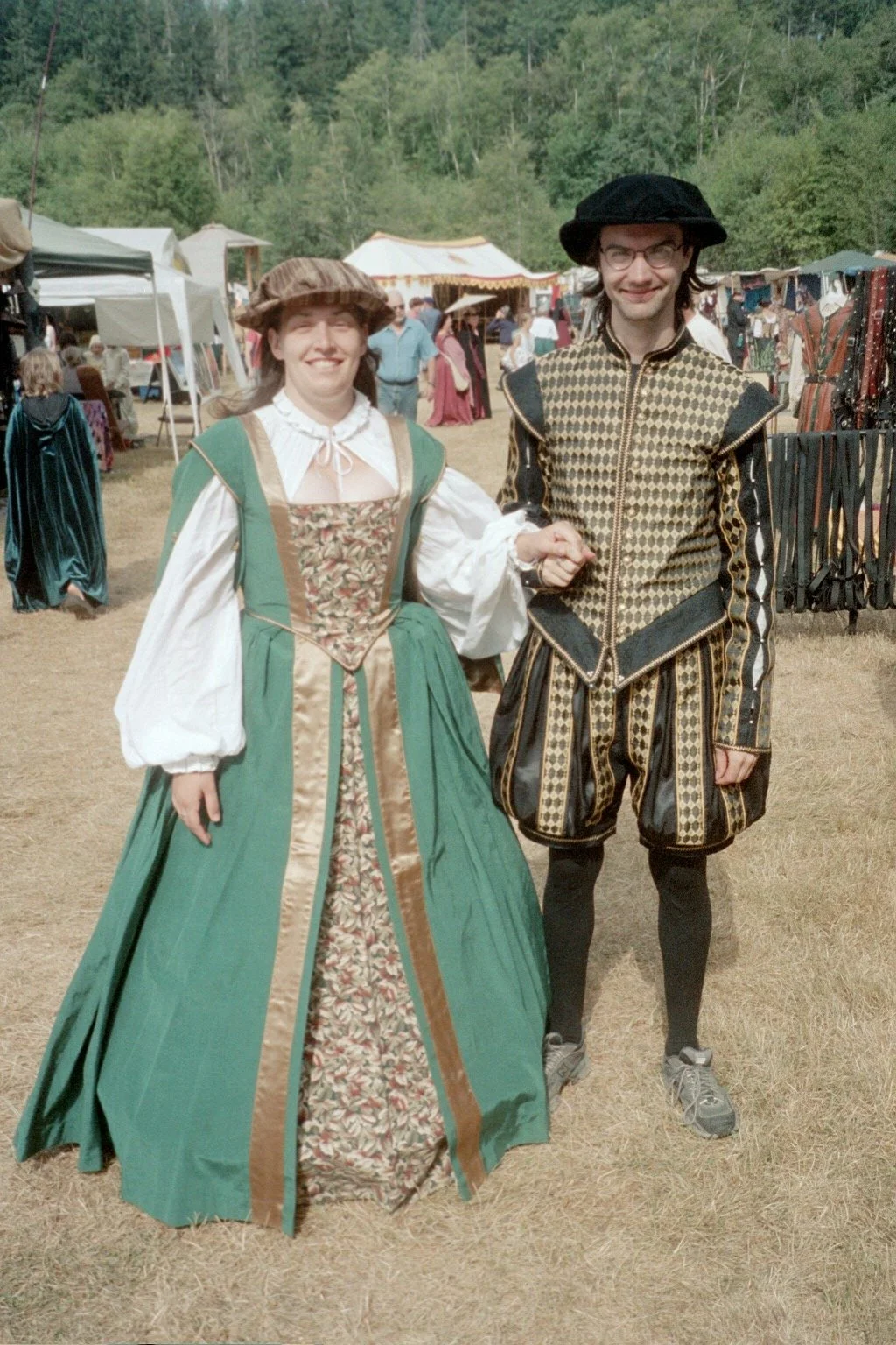 Stacy and friend dressed in Elizabethan outfits at a ren fair