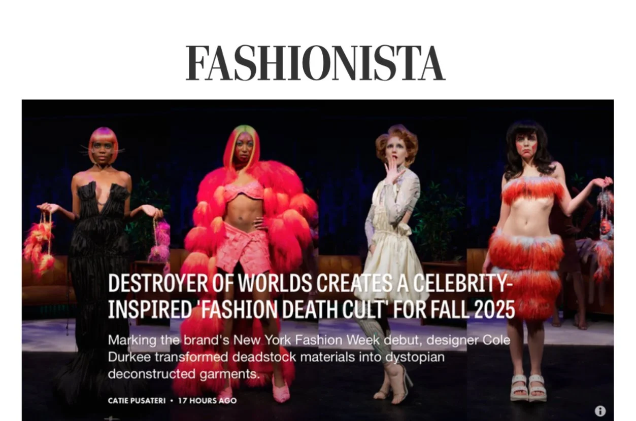 Four models on stage at a fashion show, wearing futuristic and avant-garde outfits with bold colors and textures, under a sign that reads 'FASHIONISTA'.