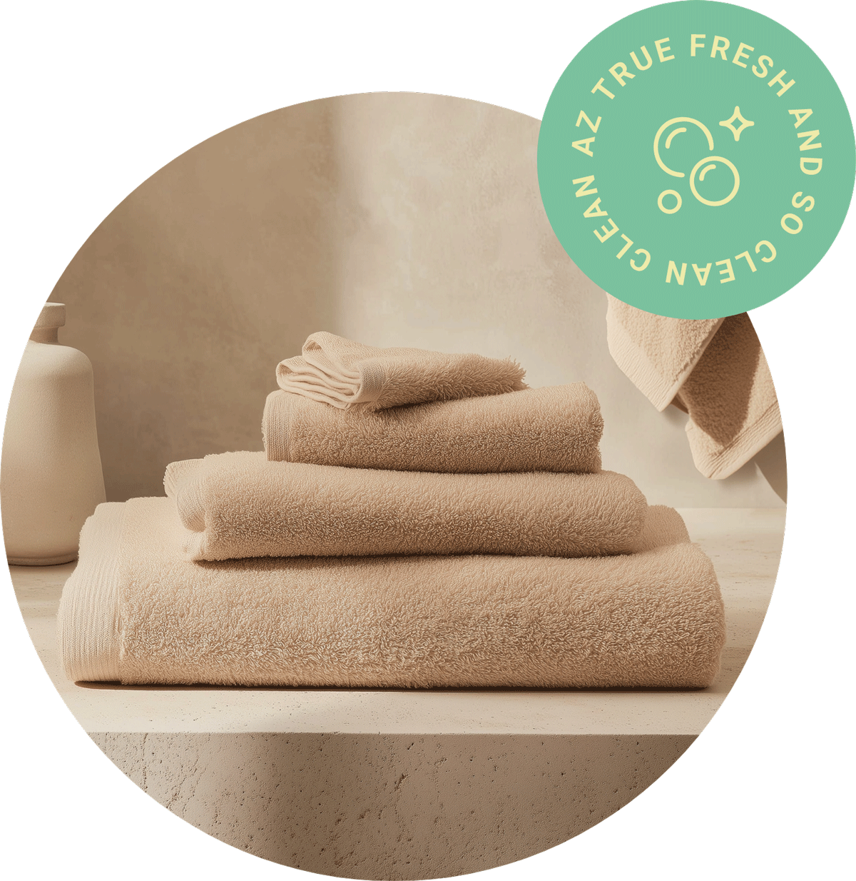 Neatly stacked beige luxury towels on stone surface with AZ True Clean badge, representing fresh and clean vacation rental turnover service in Phoenix