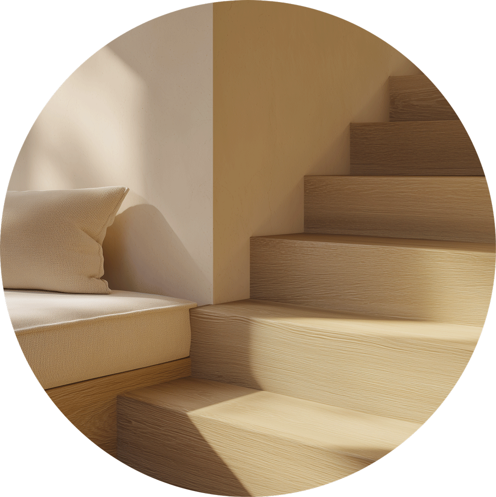 Clean modern wooden staircase with warm archway and beige built-in seating after post-construction cleaning service in Scottsdale, showcasing dust-free finishes and architectural details