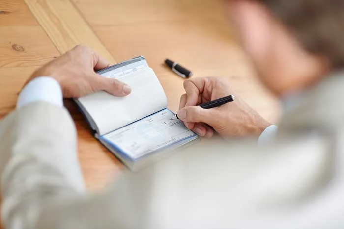 Paying bills, balancing checkbook