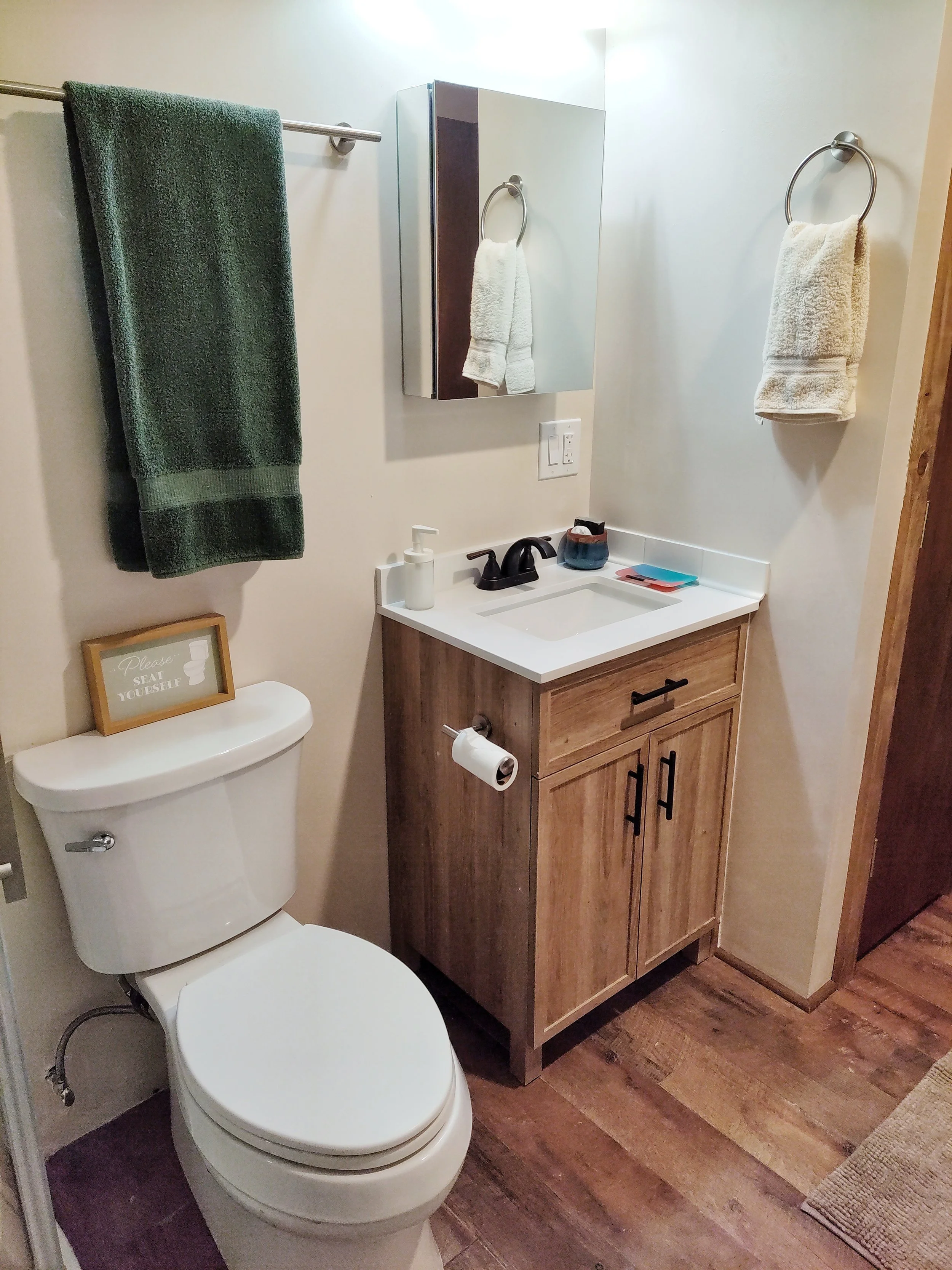 A bathroom in an adobe studio casita ina village along the High Road to Taos