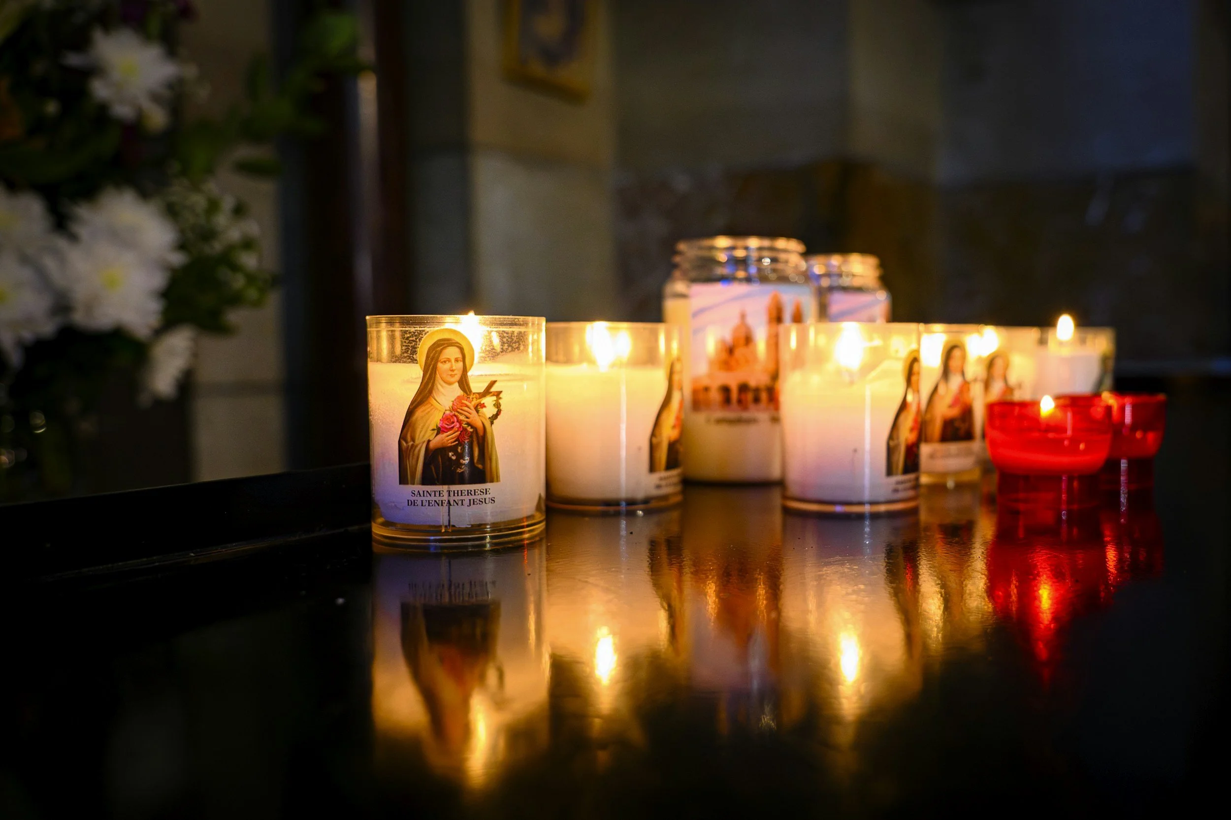 Lit candles in church