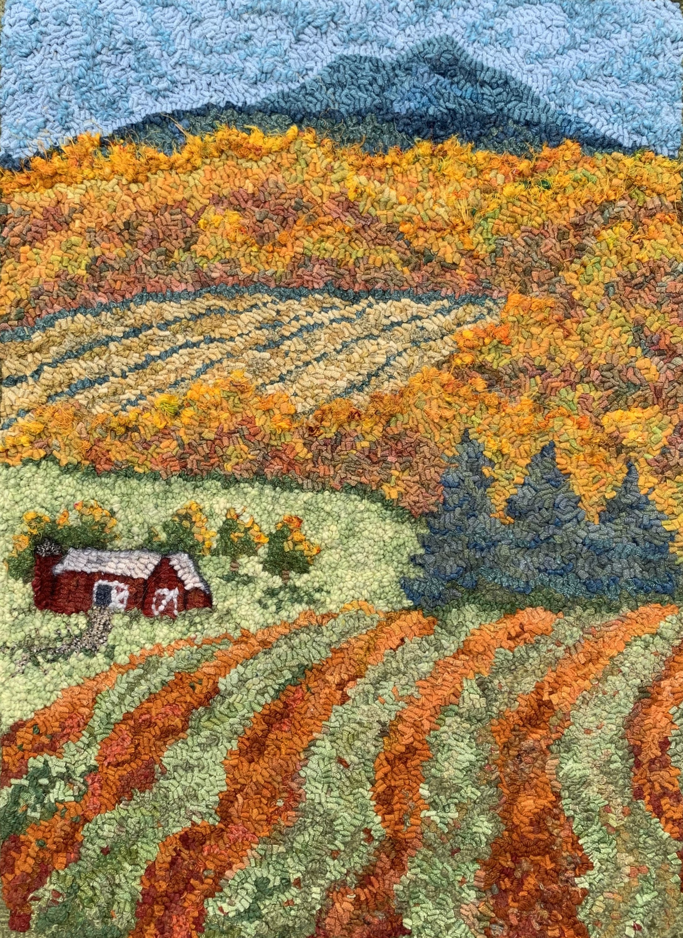 Colorful abstract landscape in a tape art style, including mountains, a river, trees, fields, and a small red house.