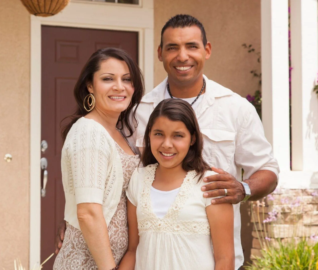 Family of three; mother, father and daughter