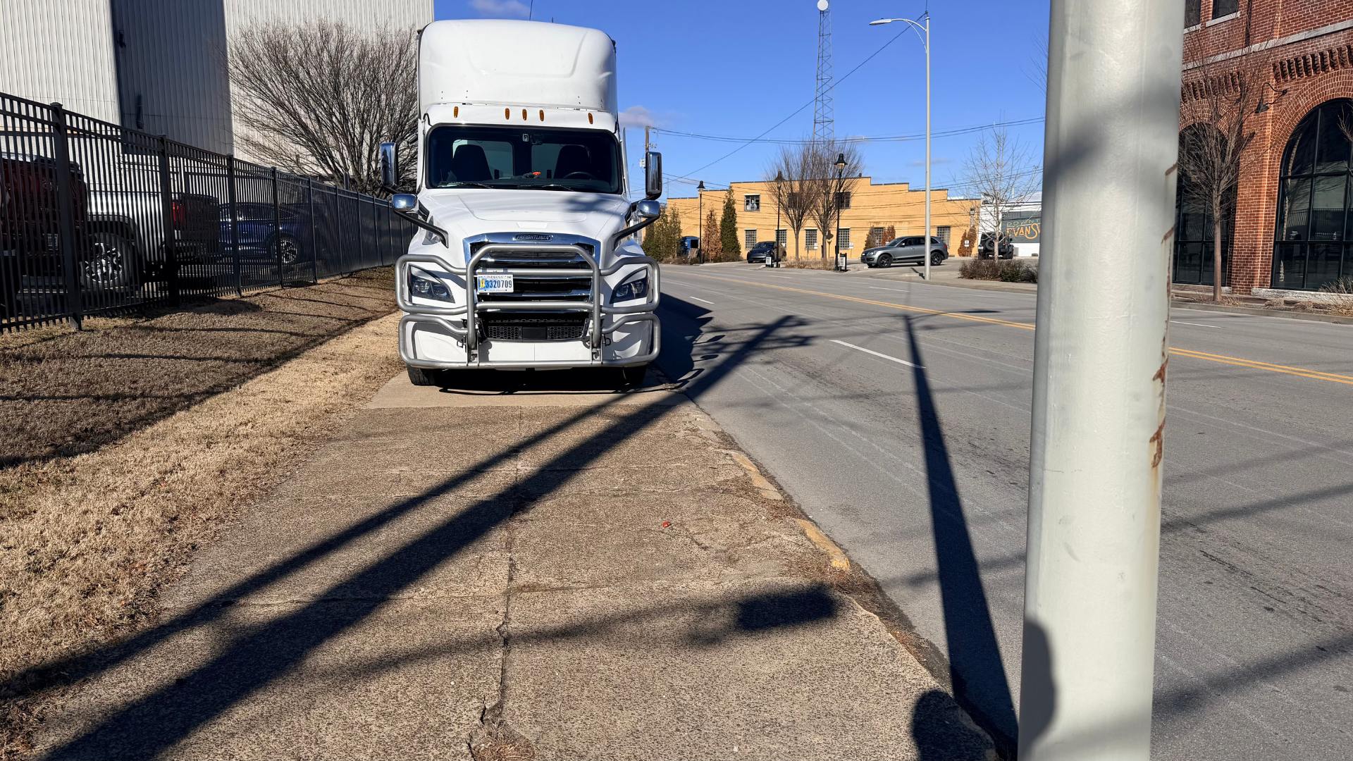 Truck and trailer parked on sidewalk Evansville