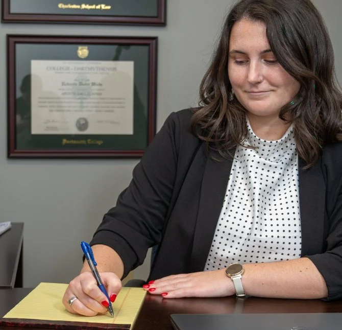 Lawyer at law firm taking notes