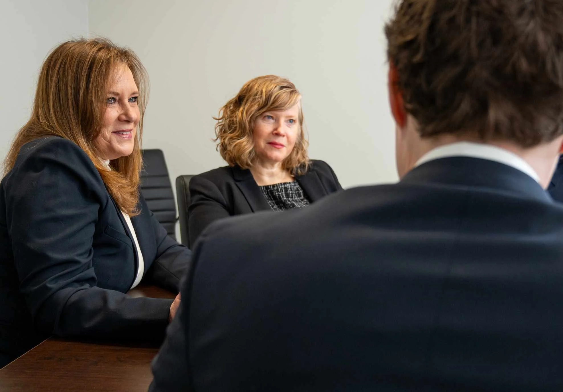 LIsa Reynolds and Shanna Stephens working on legal case