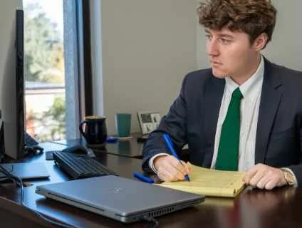 Lawyer working on insurance defense 