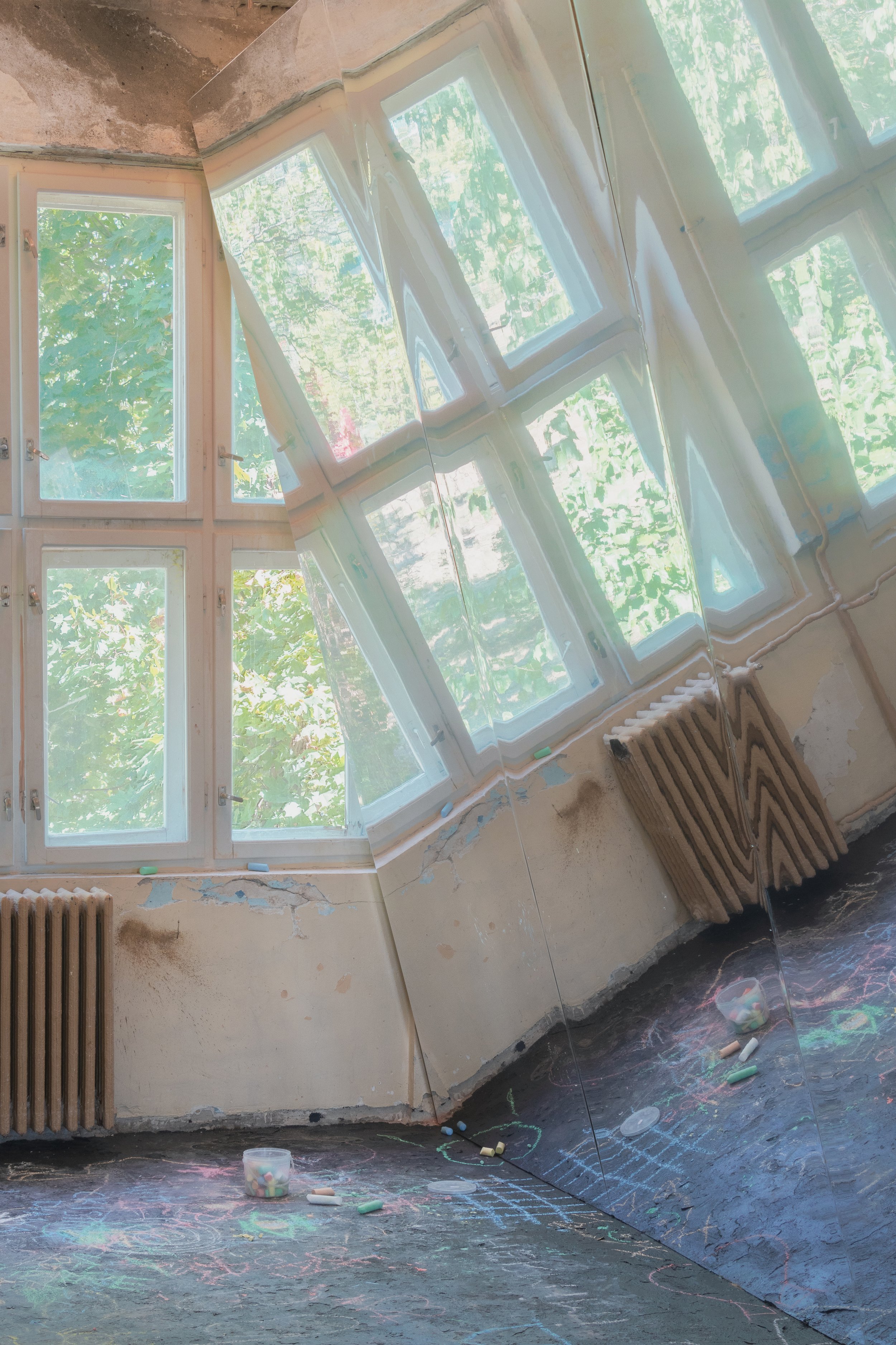 Photos by Dumitrescu David of Unlearning Square, an installation by Hermitage and Mihaela Bacu for BETA 2026, the Timișoara Architecture Biennial. Transforming a conventional, front-oriented classroom into a public square for unlearning, the project 