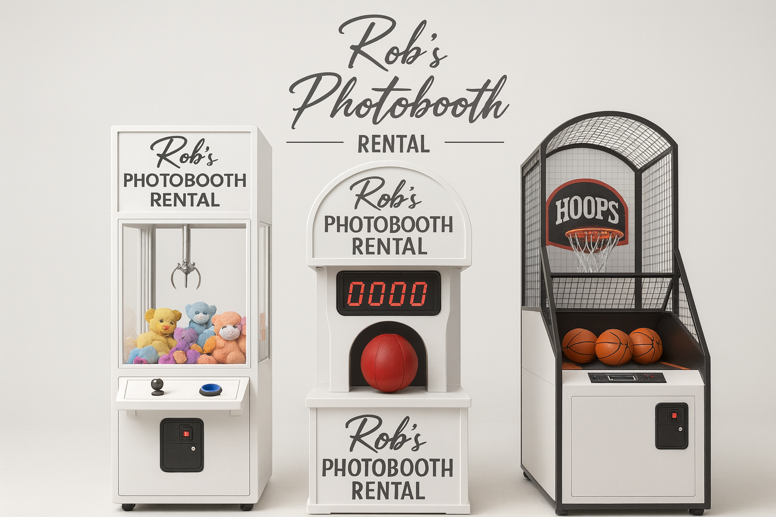 Photo booth rental setup with a claw machine filled with plush toys, a basketball-themed game with three basketballs, and a digital scoreboard, all against a white wall with 'Rob's Photobooth Rental' lettering.