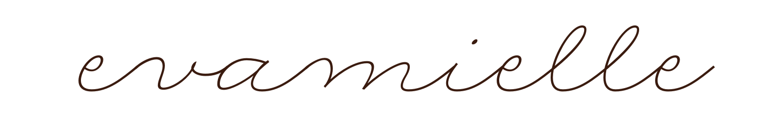The word 'evamille' written in cursive brown font on a white background.