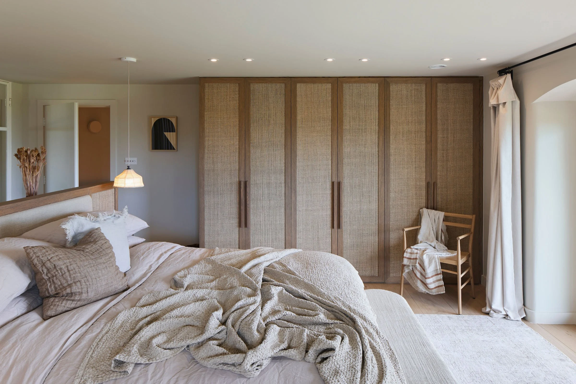 WN Interiors-Studland-primary bedrrom built in wardrobe.jpg