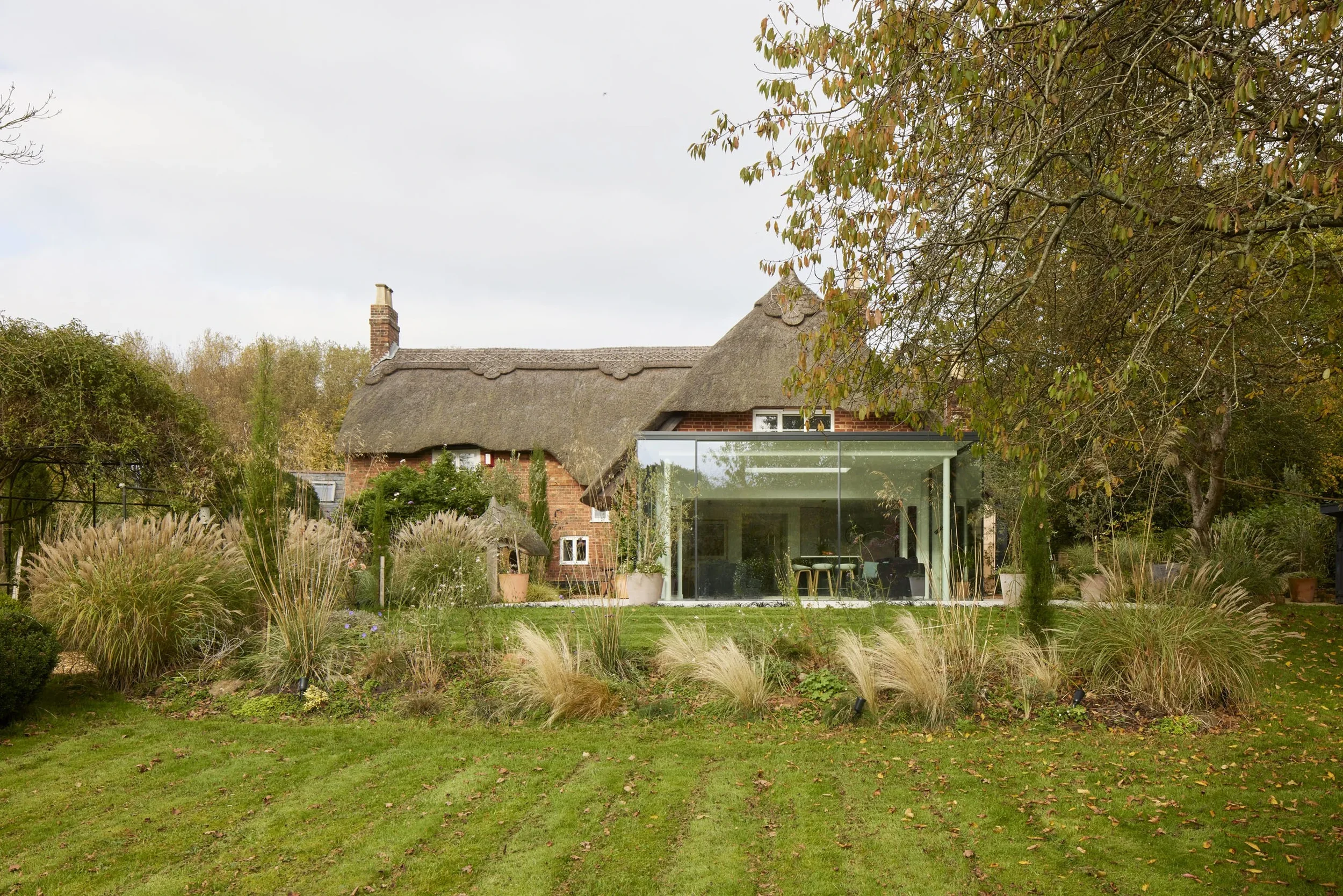 DMW-Architects-Quietly-Sourced-Glass-Box-Extension.webp