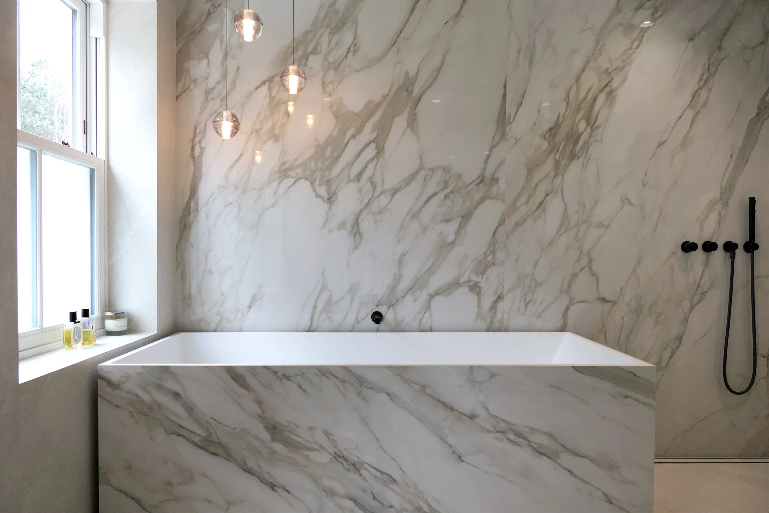 Marble vs Porcelain in residential design.
