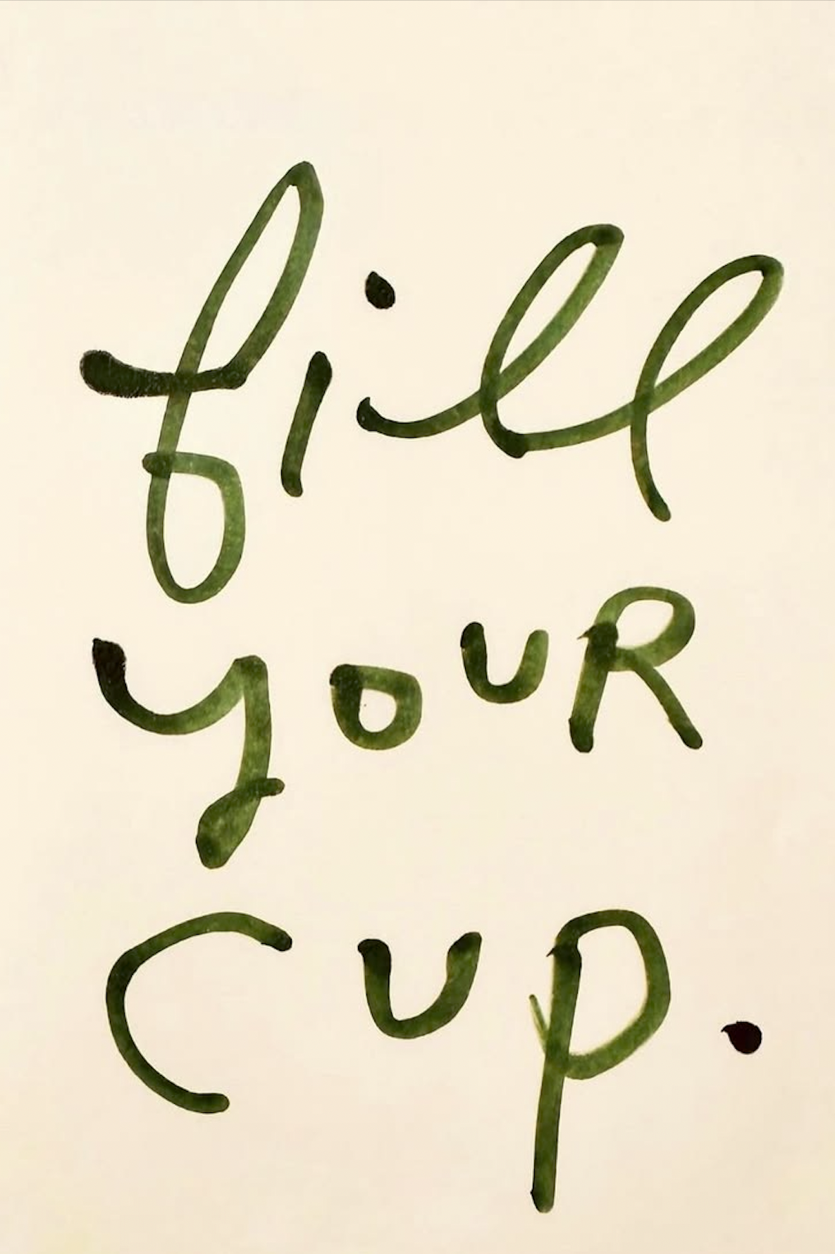 Handwritten message on paper that says "Girl, you" in green ink, with the words arranged vertically.