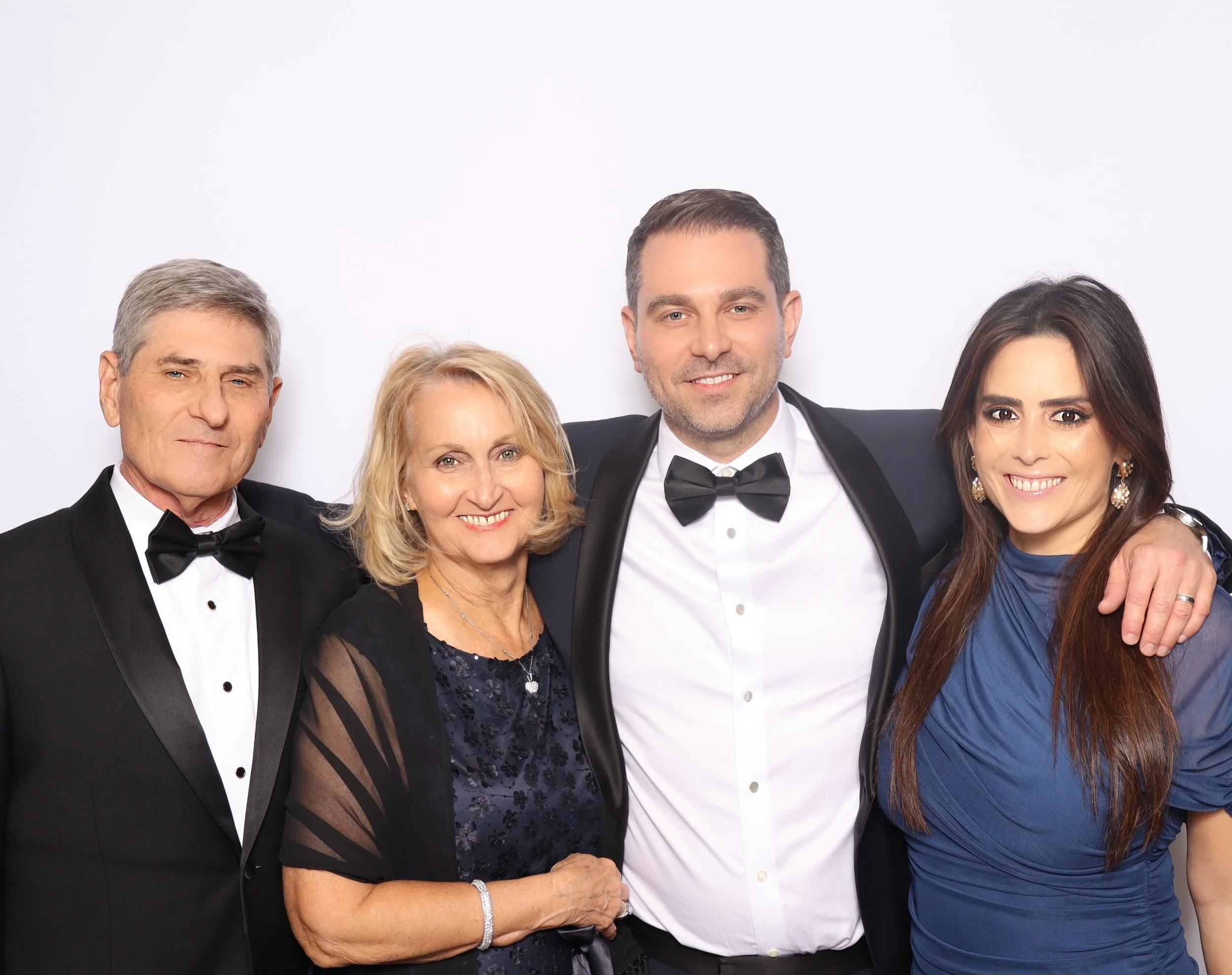 Guests posing at an upscale Fort Worth gala photo booth by Fort Worth Photo Booth Company