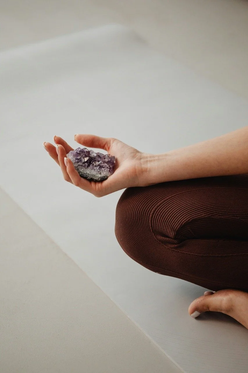 hand-holding-a-crystal-for-financial-wellness