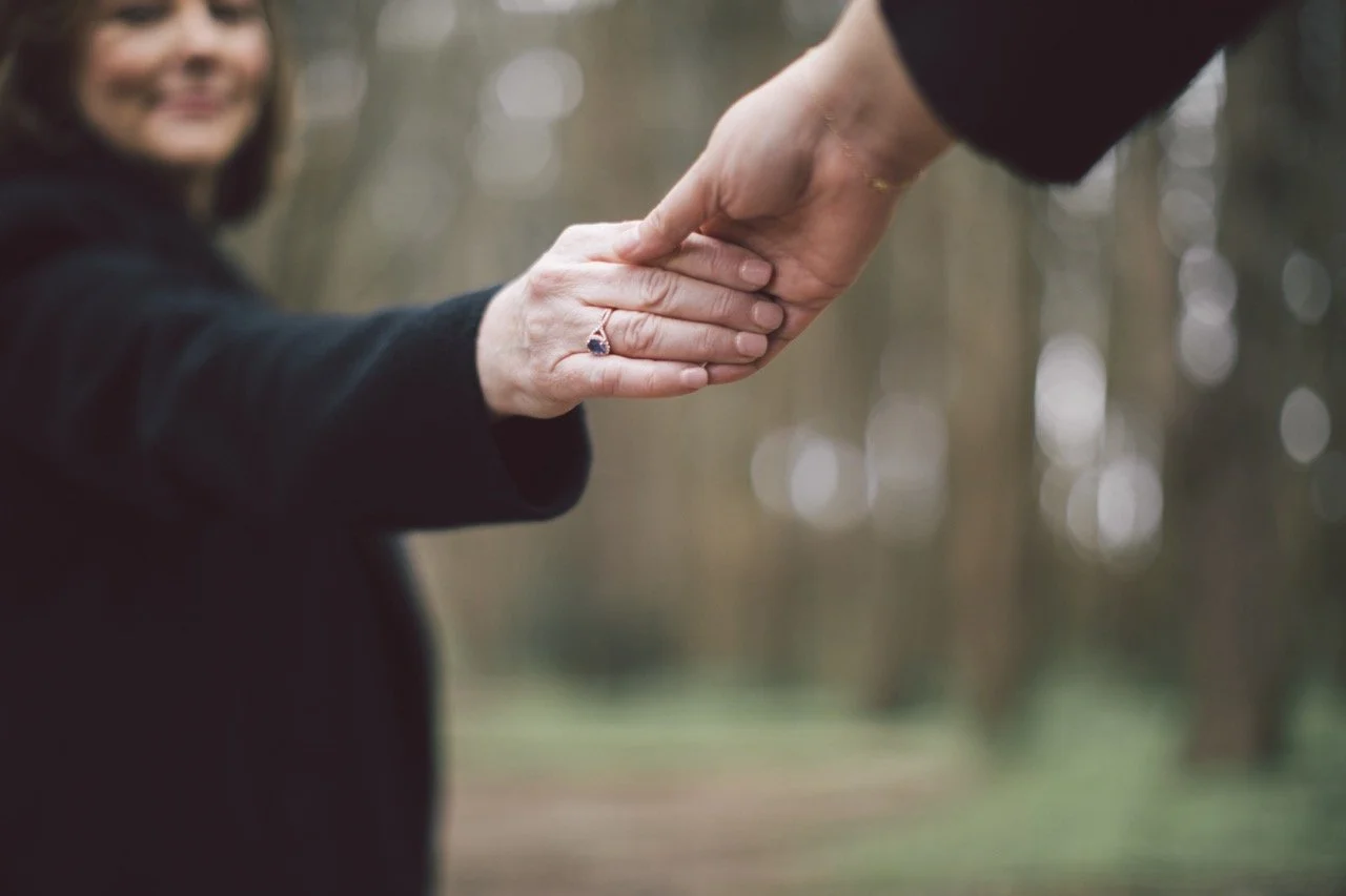 holding-hands-work-with-a-money-mentor