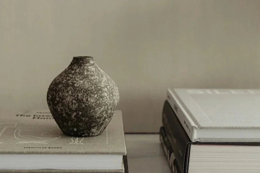 cermaic-vase-and-books-about-conscious-wealth