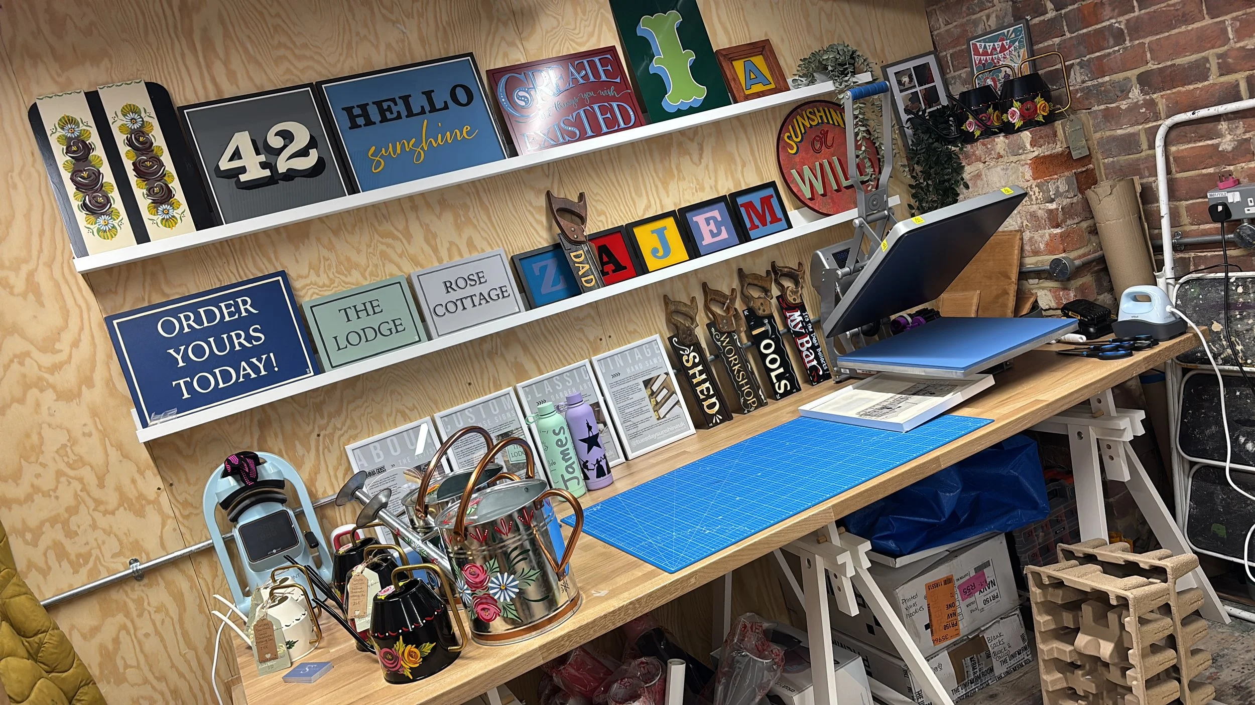 hand painted signs in studio.jpg