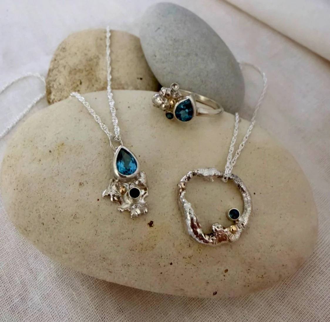 Watercast Collection - Created using the ancient technique of watercasting, where molten silver is poured directly into water to form organic, one-of-a-kind shapes. Inspired by coastal rock pools, shoreline textures and the movement of the sea.
