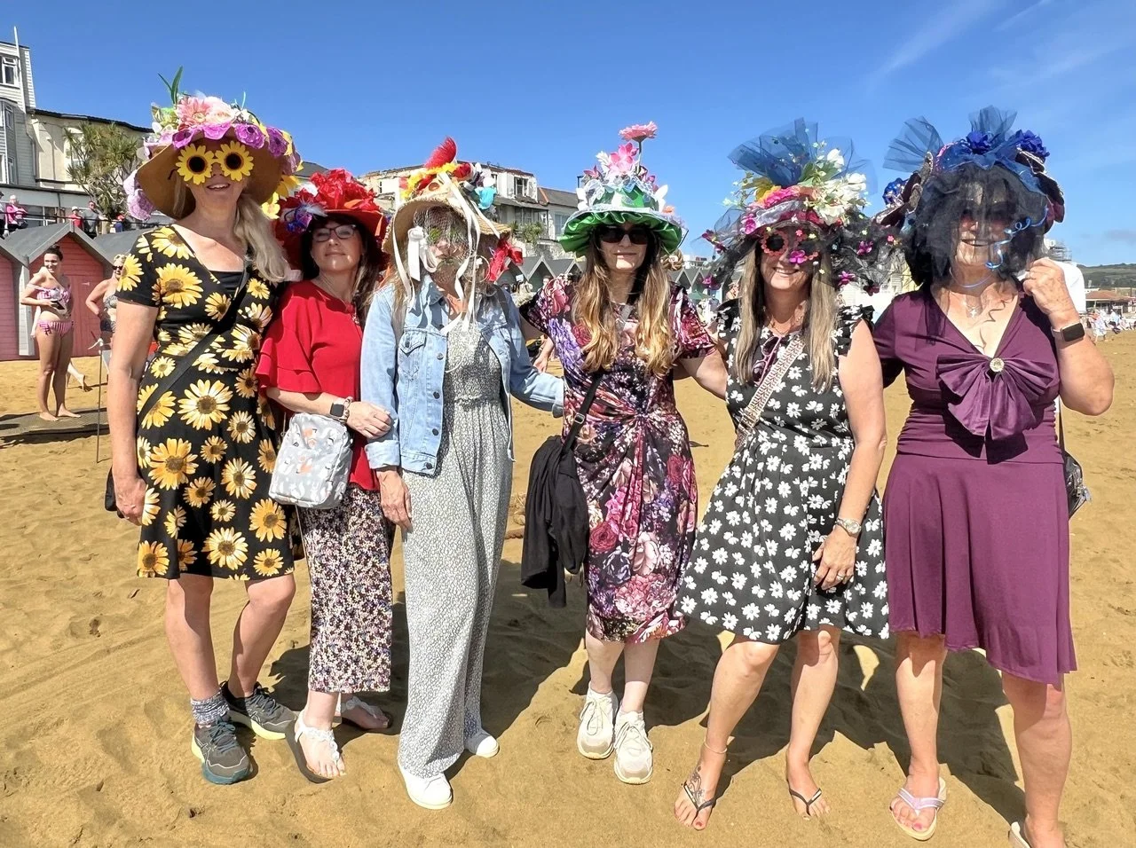 Community hats on parade in 2024, photo by Paul Coueslant.jpeg