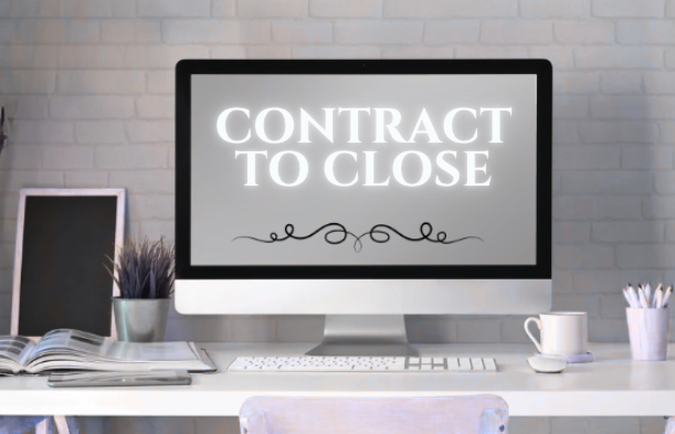 Contract to Close Services on a modern office desk setup.