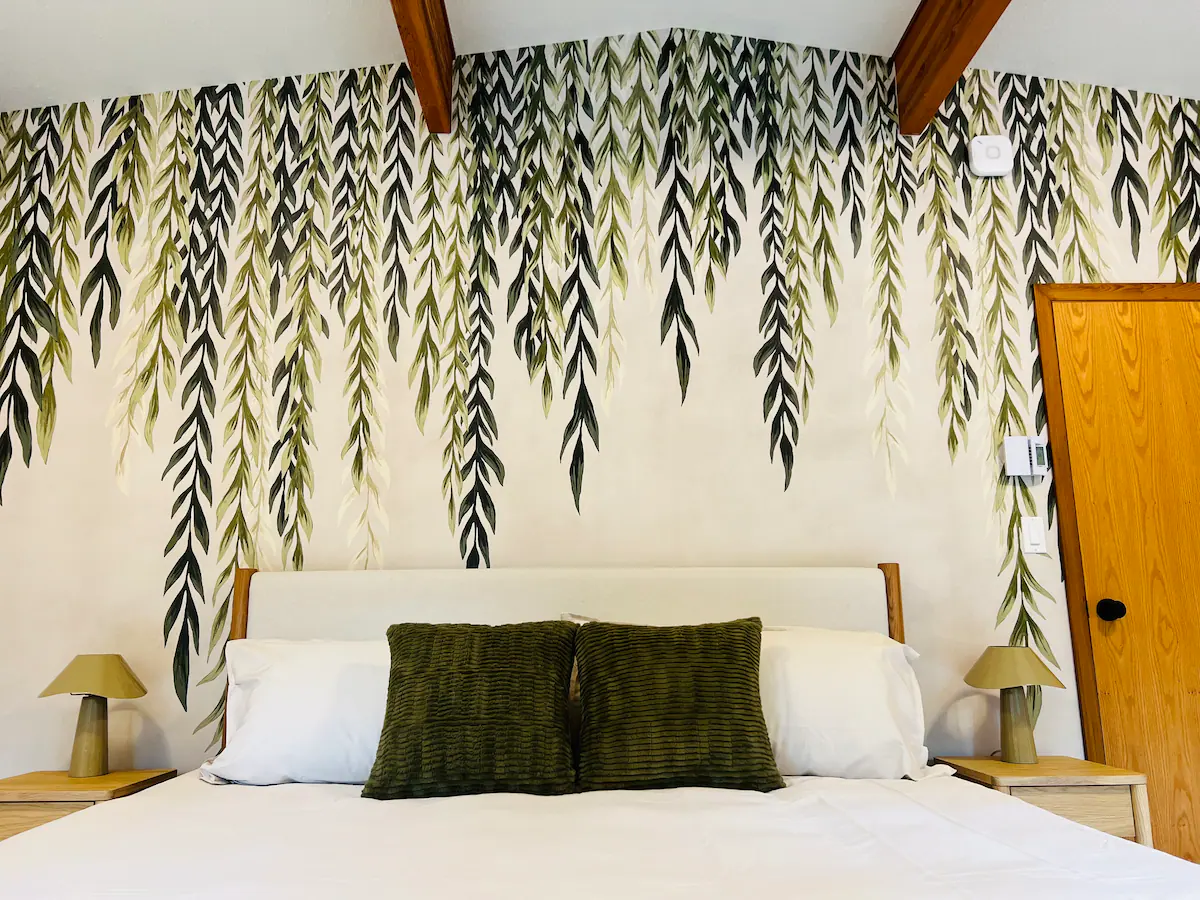 cozy king bedroom with eelart wallpaper