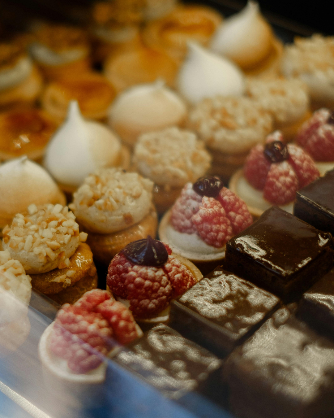 Various types of pastries in a display case.
