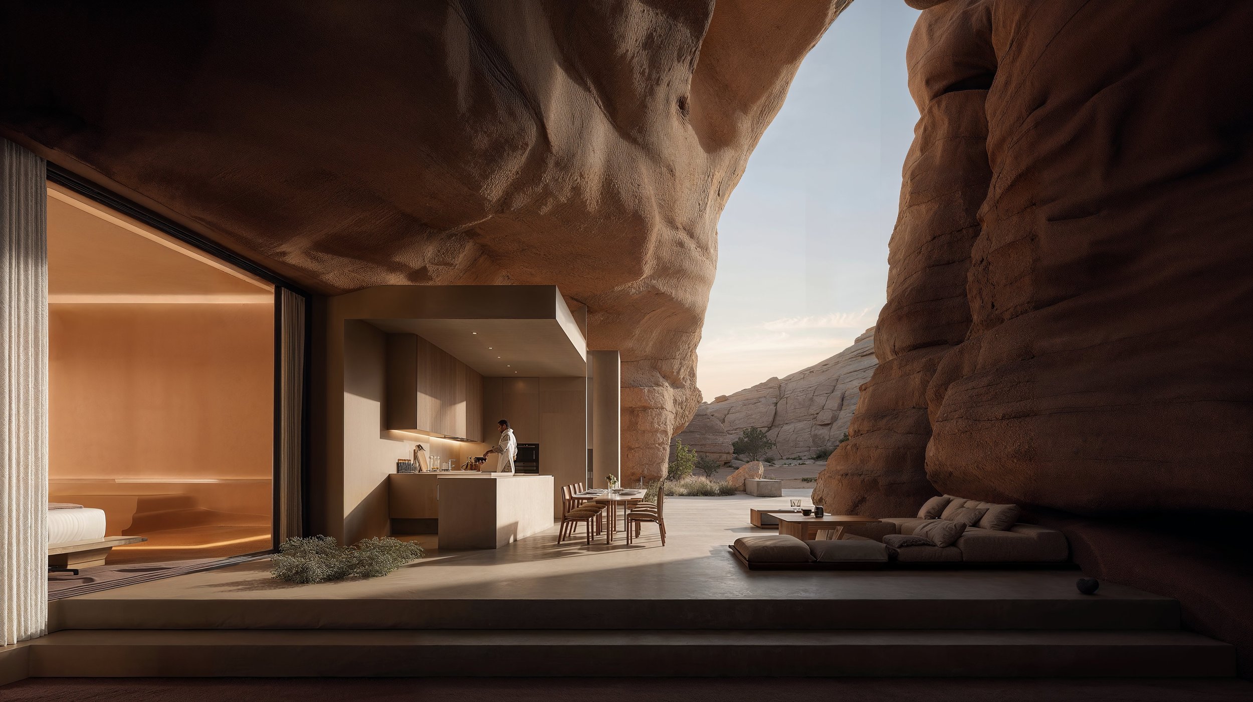Modern kitchen and outdoor lounge area in a desert landscape with large red rock formations