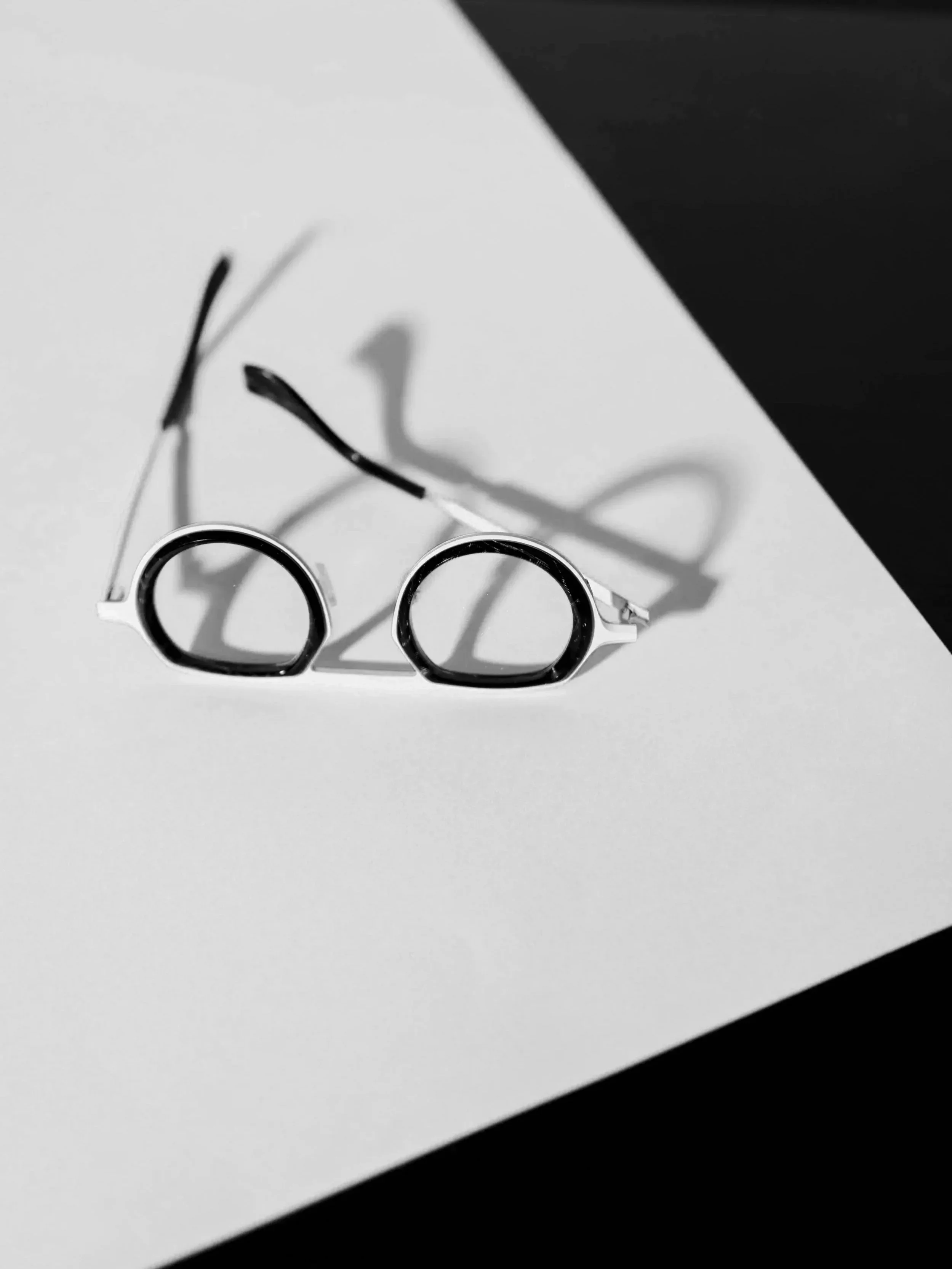 Strategic planning workspace with glasses and materials at System Partners