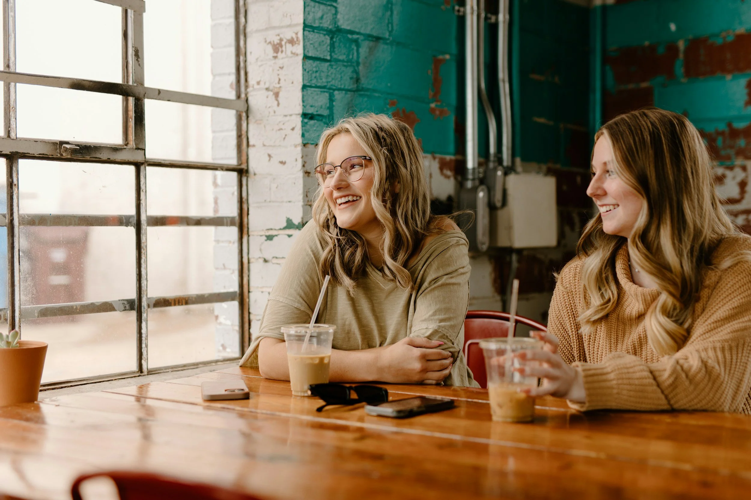 Woman journaling and cycle tracking to manage ADHD symptoms across her menstrual cycle