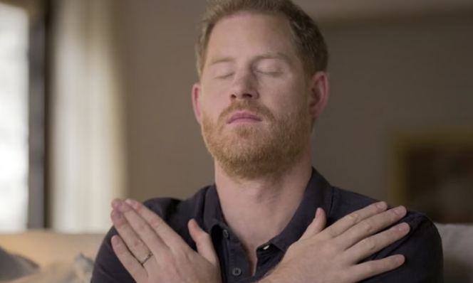 Person sitting quietly in a therapy space, representing EMDR therapy for trauma healing as shared publicly by celebrities like Prince Harry, Sandra Bullock and Miley Cyrus.