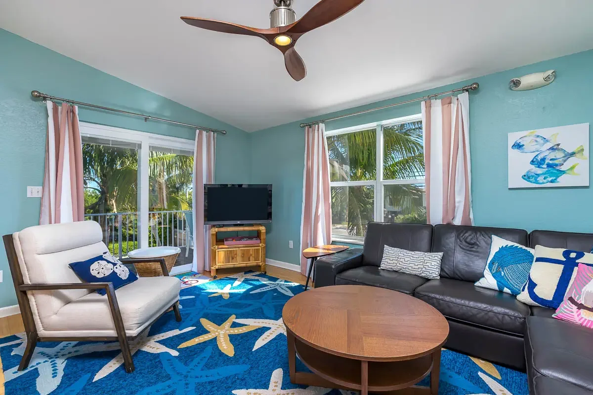 Primary bedroom in a luxury Florida Keys vacation rental with coastal design and natural light