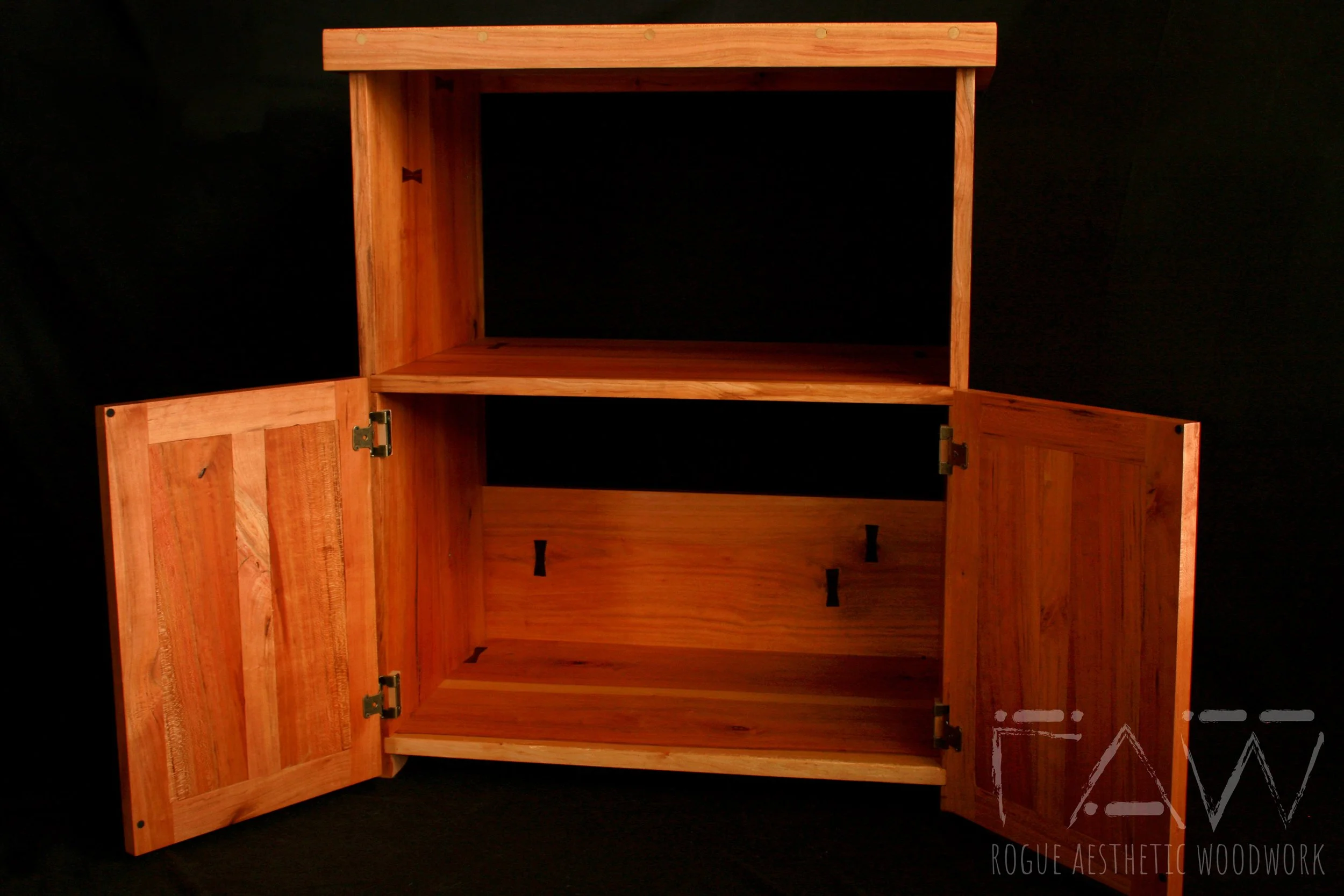 solid cherry hardwood coffee stand with shaker style cabinet doors and a low hand shaped curved rail — bespoke furniture by Rogue Aesthetic Woodwork, High Springs FL